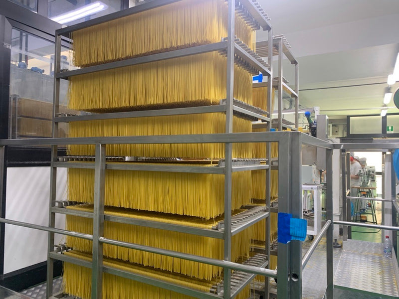Pasta drying on the racks, May 2022