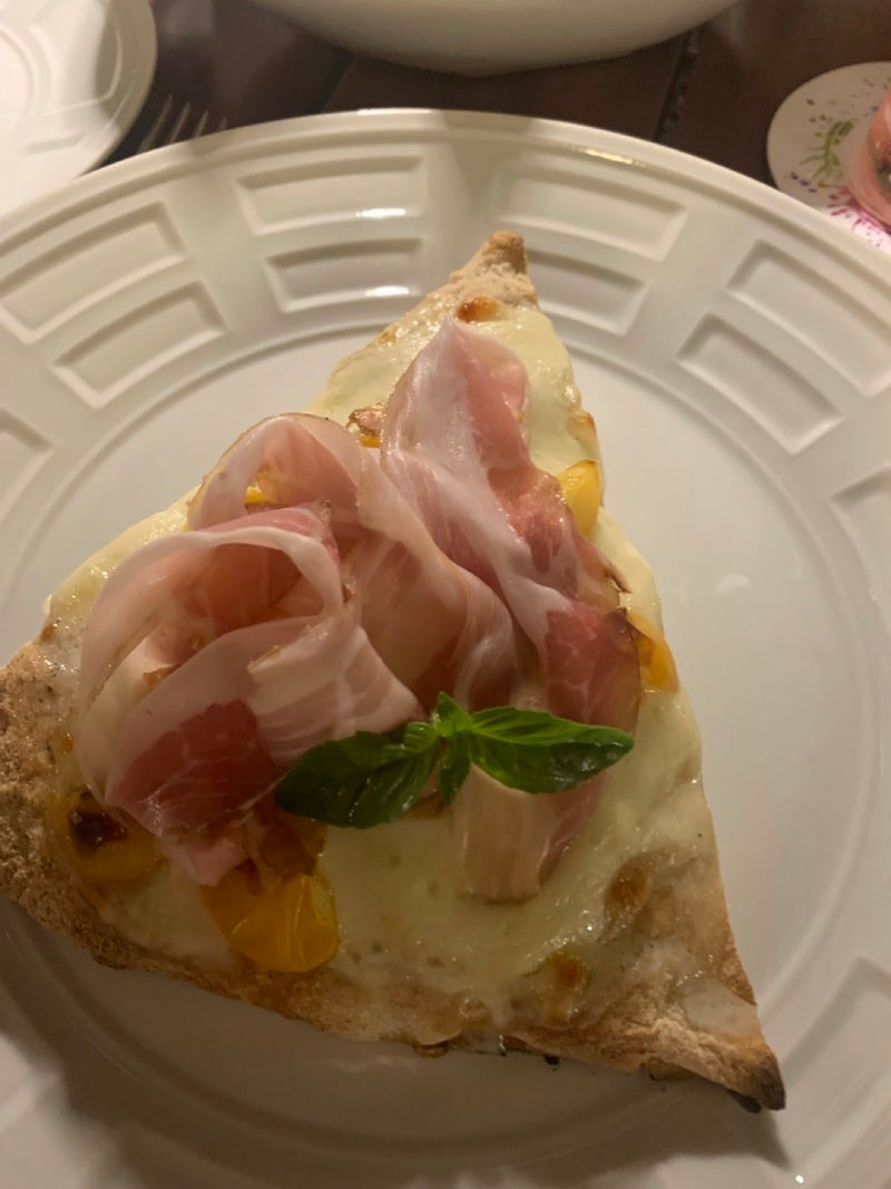 Pizza with prosciutto crudo, Tuscany, May 2022